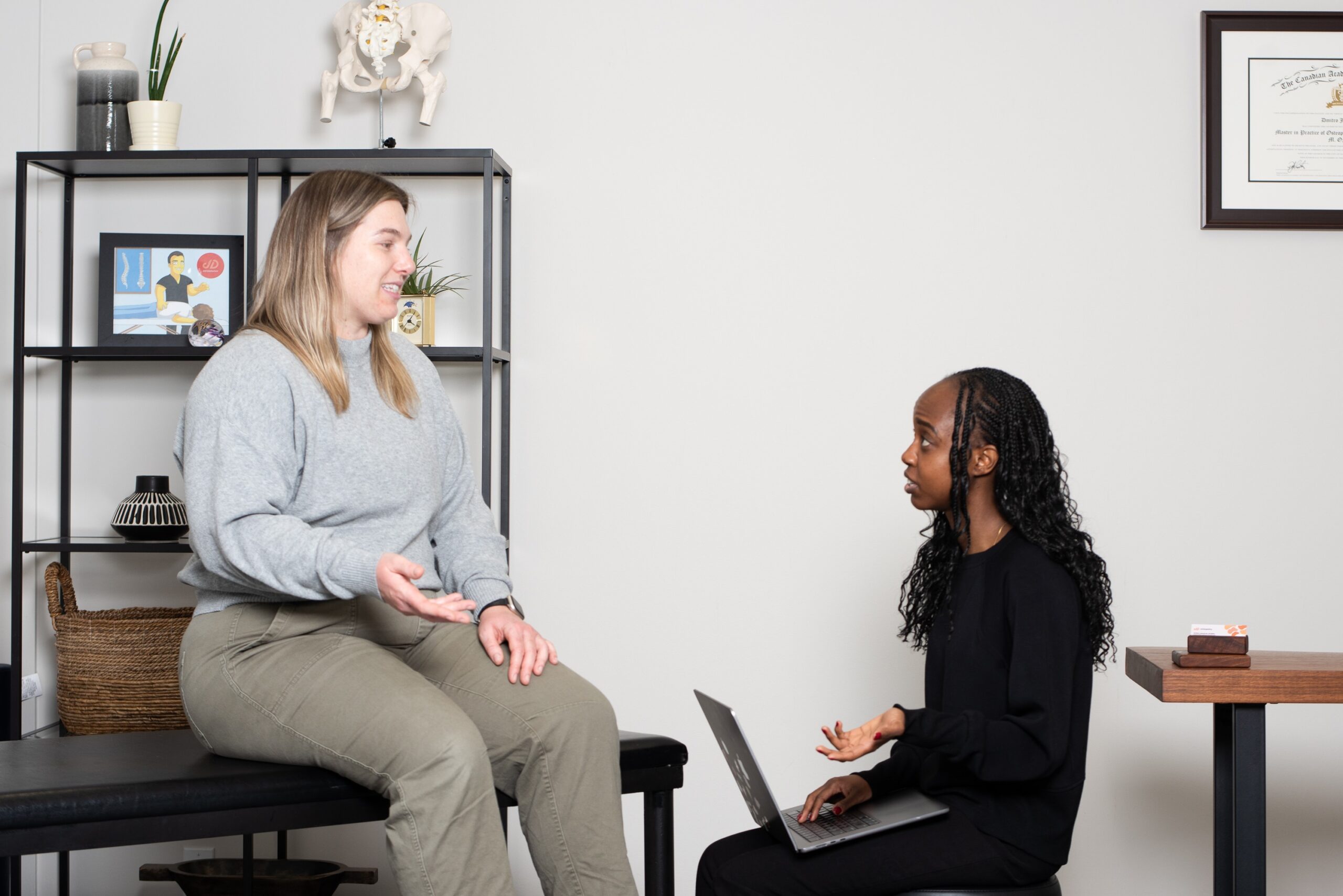 Getting Started With Osteopathy in Mississauga: What to Expect 1 Joanna consulting patient